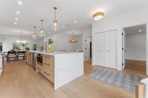 12 Prominence Point Sw, Calgary, AB - Indoor Photo Showing Kitchen With Upgraded Kitchen