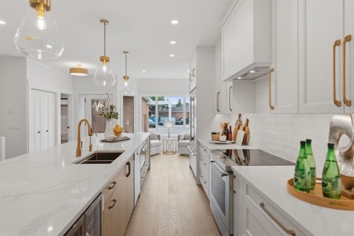 12 Prominence Point Sw, Calgary, AB - Indoor Photo Showing Kitchen With Double Sink With Upgraded Kitchen