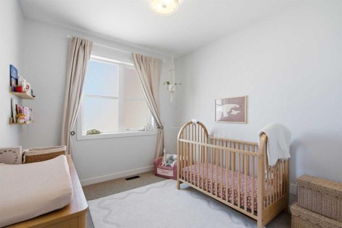 2-4733 17 Avenue Nw, Calgary, AB - Indoor Photo Showing Bedroom