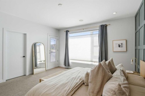 2-4733 17 Avenue Nw, Calgary, AB - Indoor Photo Showing Bedroom