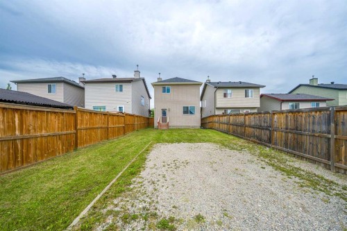 183 Silverado Way Sw, Calgary, AB - Outdoor With Backyard With Exterior