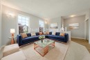 183 Silverado Way Sw, Calgary, AB  - Indoor Photo Showing Living Room 