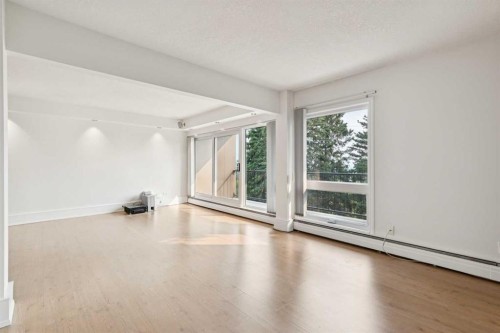 204-328 Cedar Crescent Sw, Calgary, AB - Indoor Photo Showing Other Room