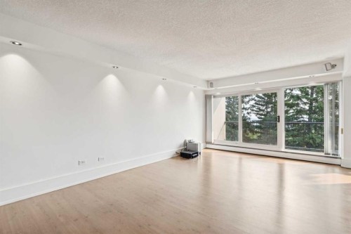 204-328 Cedar Crescent Sw, Calgary, AB - Indoor Photo Showing Other Room