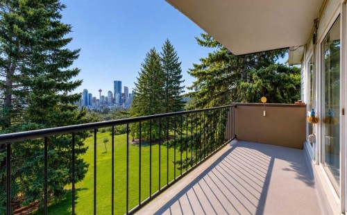 204-328 Cedar Crescent Sw, Calgary, AB - Outdoor With Balcony With Exterior