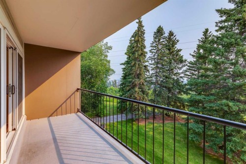 204-328 Cedar Crescent Sw, Calgary, AB - Outdoor With Balcony With Exterior