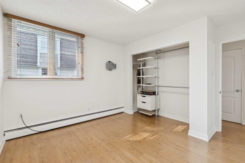 204-328 Cedar Crescent Sw, Calgary, AB - Indoor Photo Showing Other Room