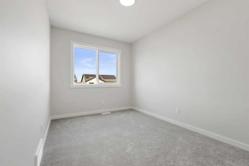36 Heartwood Lane Se, Calgary, AB - Indoor Photo Showing Other Room