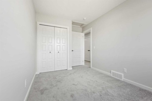 36 Heartwood Lane Se, Calgary, AB - Indoor Photo Showing Other Room
