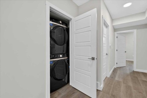 36 Heartwood Lane Se, Calgary, AB - Indoor Photo Showing Laundry Room