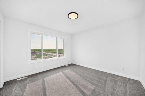 182 Lanark Gate Se, Airdrie, AB - Indoor Photo Showing Other Room