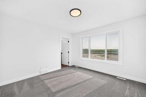 182 Lanark Gate Se, Airdrie, AB - Indoor Photo Showing Other Room