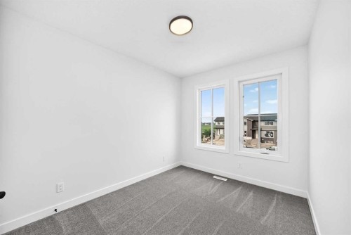 182 Lanark Gate Se, Airdrie, AB - Indoor Photo Showing Other Room