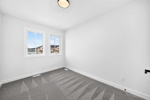 182 Lanark Gate Se, Airdrie, AB - Indoor Photo Showing Other Room