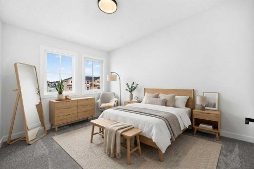 182 Lanark Gate Se, Airdrie, AB - Indoor Photo Showing Bedroom