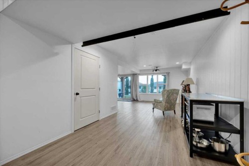 226 Sunset Point, Cochrane, AB - Indoor Photo Showing Other Room