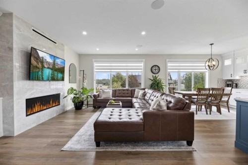 13 Keown Close, Olds, AB - Indoor Photo Showing Living Room With Fireplace