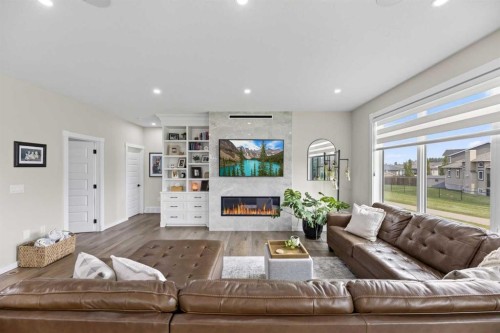13 Keown Close, Olds, AB - Indoor Photo Showing Living Room With Fireplace