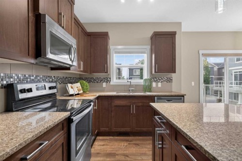 558 Evanston Manor Nw, Calgary, AB - Indoor Photo Showing Kitchen With Stainless Steel Kitchen With Upgraded Kitchen