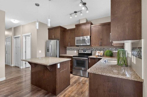 558 Evanston Manor Nw, Calgary, AB - Indoor Photo Showing Kitchen With Stainless Steel Kitchen With Upgraded Kitchen