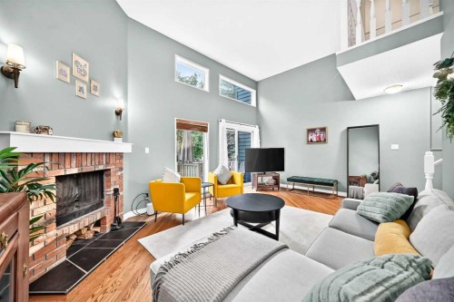 213 Point Mckay Terrace Nw, Calgary, AB - Indoor Photo Showing Living Room With Fireplace