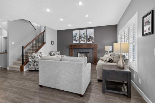234 Pantego Way Nw, Calgary, AB - Indoor Photo Showing Living Room With Fireplace
