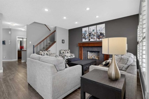 234 Pantego Way Nw, Calgary, AB - Indoor Photo Showing Living Room With Fireplace