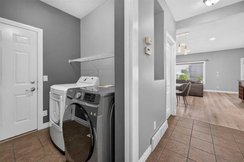168 Covepark Rise Ne, Calgary, AB - Indoor Photo Showing Laundry Room