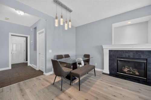168 Covepark Rise Ne, Calgary, AB - Indoor Photo Showing Living Room With Fireplace