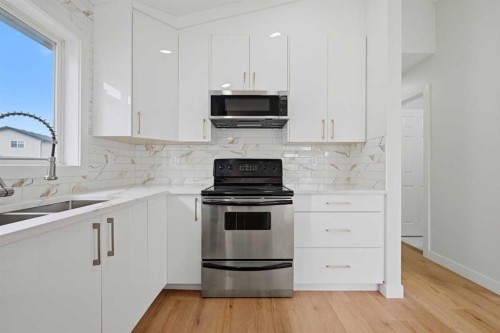 176 Taracove Estate Drive Ne, Calgary, AB - Indoor Photo Showing Kitchen