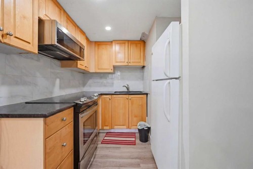 176 Taracove Estate Drive Ne, Calgary, AB - Indoor Photo Showing Kitchen