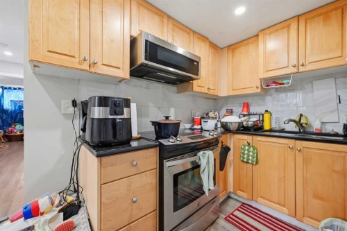 176 Taracove Estate Drive Ne, Calgary, AB - Indoor Photo Showing Kitchen