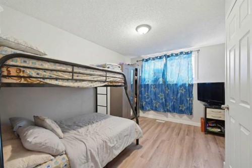 176 Taracove Estate Drive Ne, Calgary, AB - Indoor Photo Showing Bedroom