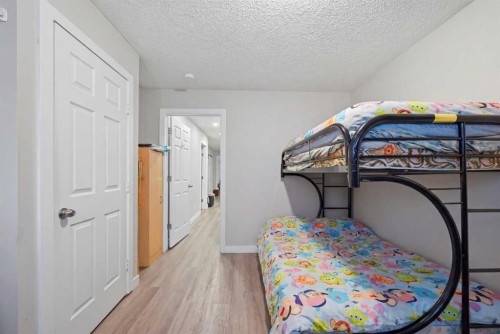 176 Taracove Estate Drive Ne, Calgary, AB - Indoor Photo Showing Bedroom