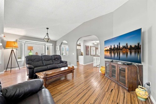 128 Sienna Park Green Sw, Calgary, AB - Indoor Photo Showing Living Room