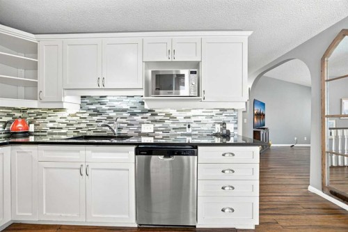 128 Sienna Park Green Sw, Calgary, AB - Indoor Photo Showing Kitchen With Upgraded Kitchen