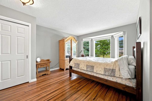 128 Sienna Park Green Sw, Calgary, AB - Indoor Photo Showing Bedroom