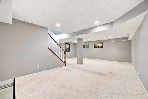 128 Sienna Park Green Sw, Calgary, AB - Indoor Photo Showing Other Room