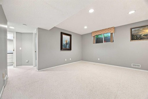 128 Sienna Park Green Sw, Calgary, AB - Indoor Photo Showing Other Room