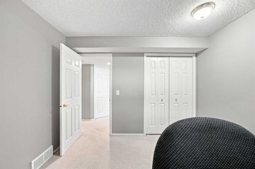 128 Sienna Park Green Sw, Calgary, AB - Indoor Photo Showing Bedroom