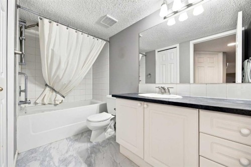 128 Sienna Park Green Sw, Calgary, AB - Indoor Photo Showing Bathroom