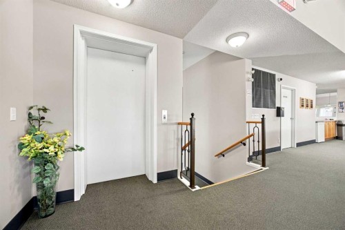 128 Sienna Park Green Sw, Calgary, AB - Indoor Photo Showing Other Room
