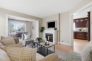 135 Douglas Woods Hill Se, Calgary, AB  - Indoor Photo Showing Living Room With Fireplace 
