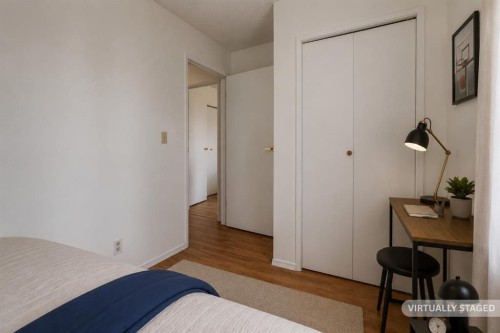102-1835 10 Avenue Se, Calgary, AB - Indoor Photo Showing Bedroom