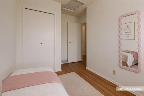 102-1835 10 Avenue Se, Calgary, AB - Indoor Photo Showing Bedroom