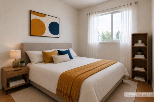 102-1835 10 Avenue Se, Calgary, AB - Indoor Photo Showing Bedroom
