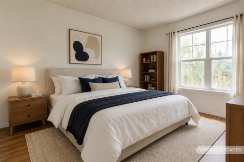 102-1835 10 Avenue Se, Calgary, AB - Indoor Photo Showing Bedroom