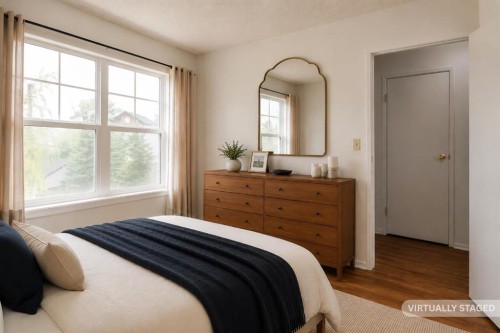 102-1835 10 Avenue Se, Calgary, AB - Indoor Photo Showing Bedroom