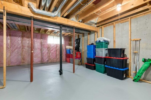 102-1835 10 Avenue Se, Calgary, AB - Indoor Photo Showing Basement