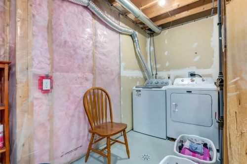 102-1835 10 Avenue Se, Calgary, AB - Indoor Photo Showing Laundry Room